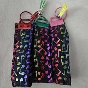 Rainbow Music Note Keychain Wristlet - Black Background
